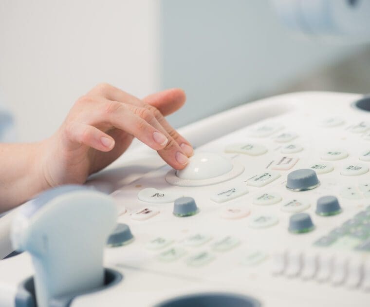 A professional uses an ultrasound machine