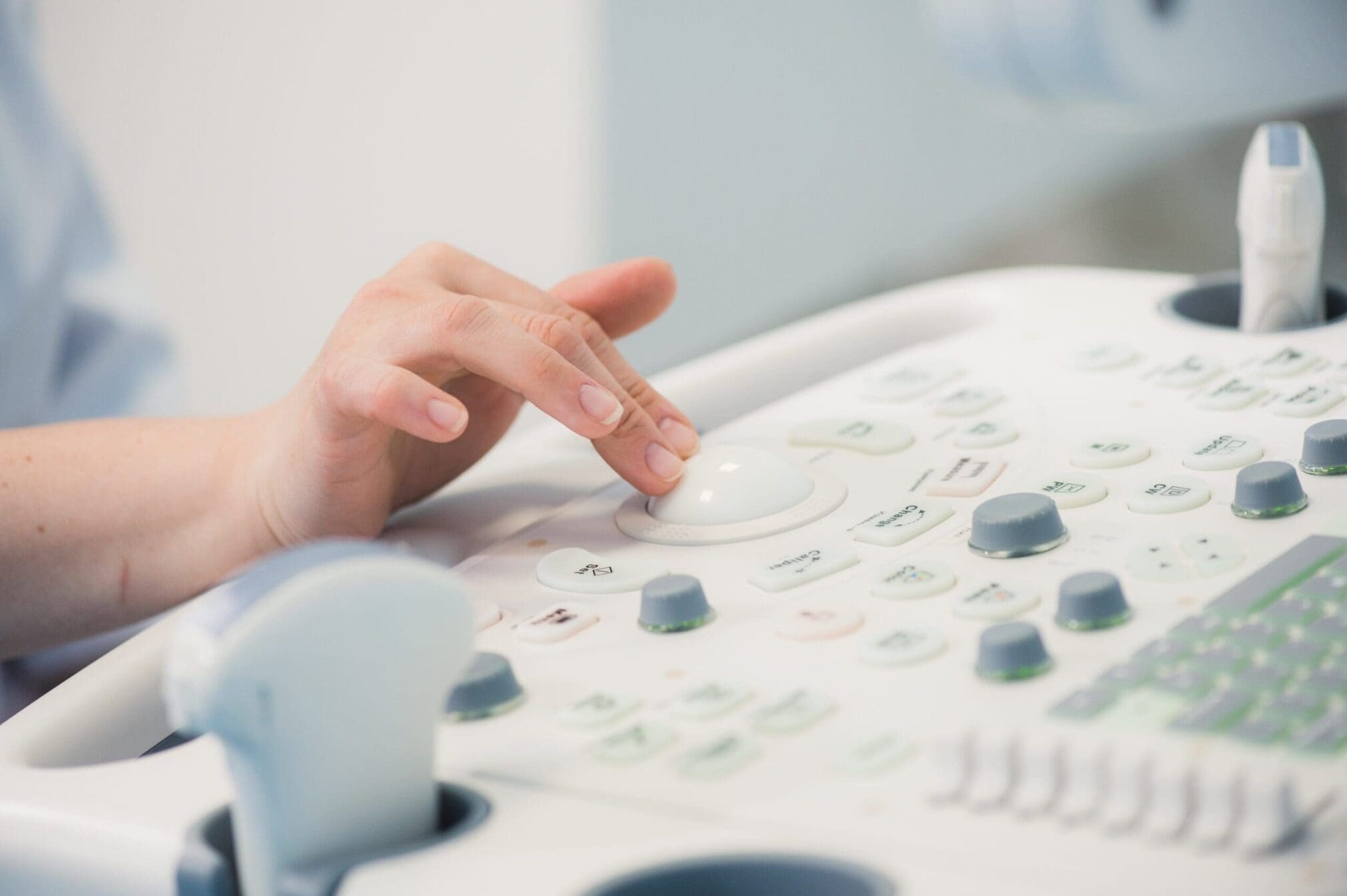 A professional uses an ultrasound machine