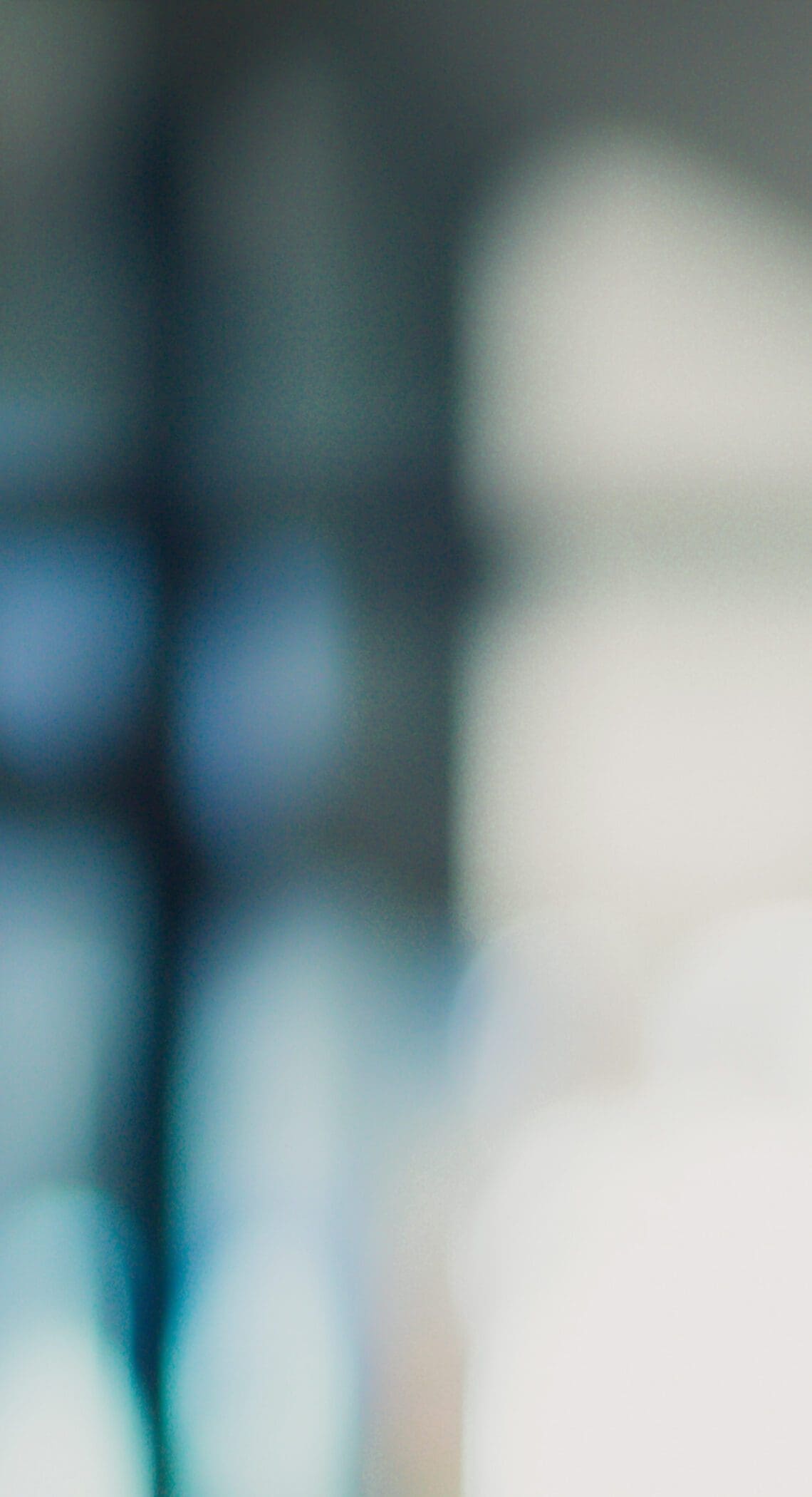 A blurry image containing blue, white and grey circles