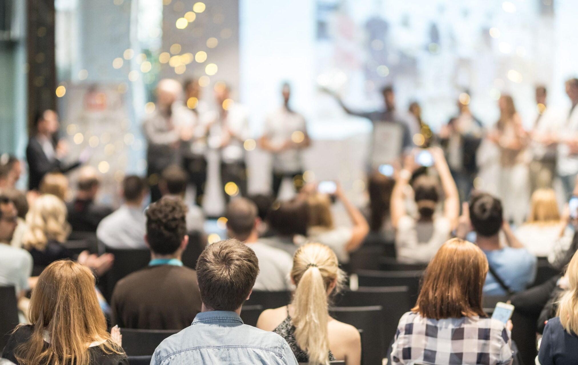 Attendees in a conference room