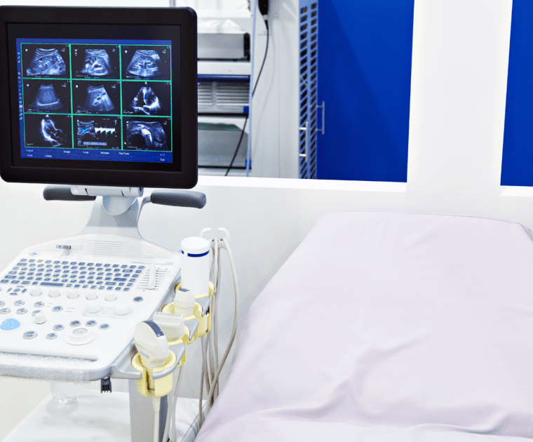 A hospital bed equipped with a monitor