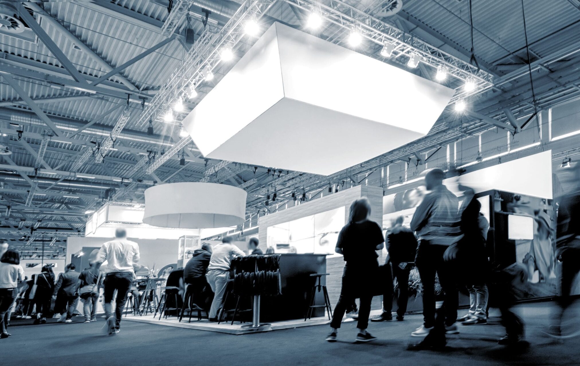 Obelis booth at a trade show with attendees