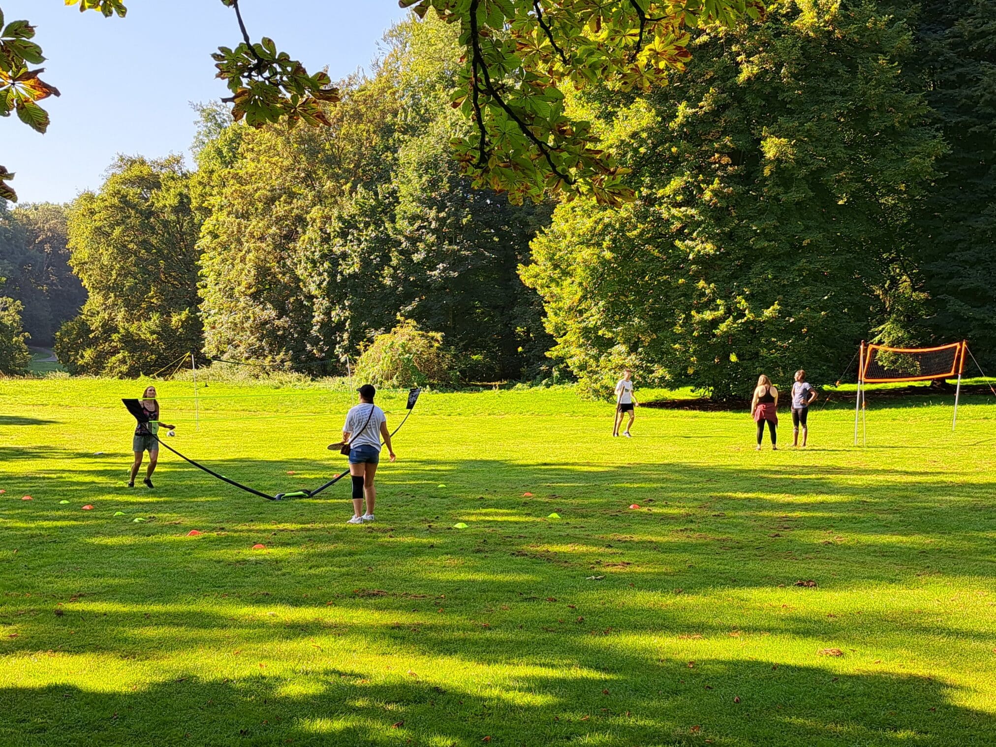 A group of people playing in the park